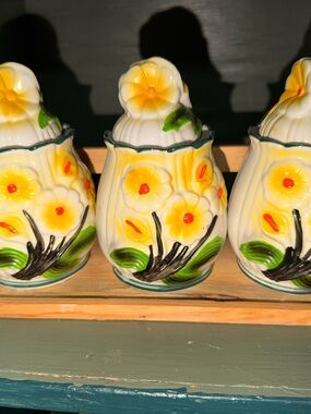 Vintage 3 Piece Flower Canister Set and Wooden Holder.See pics